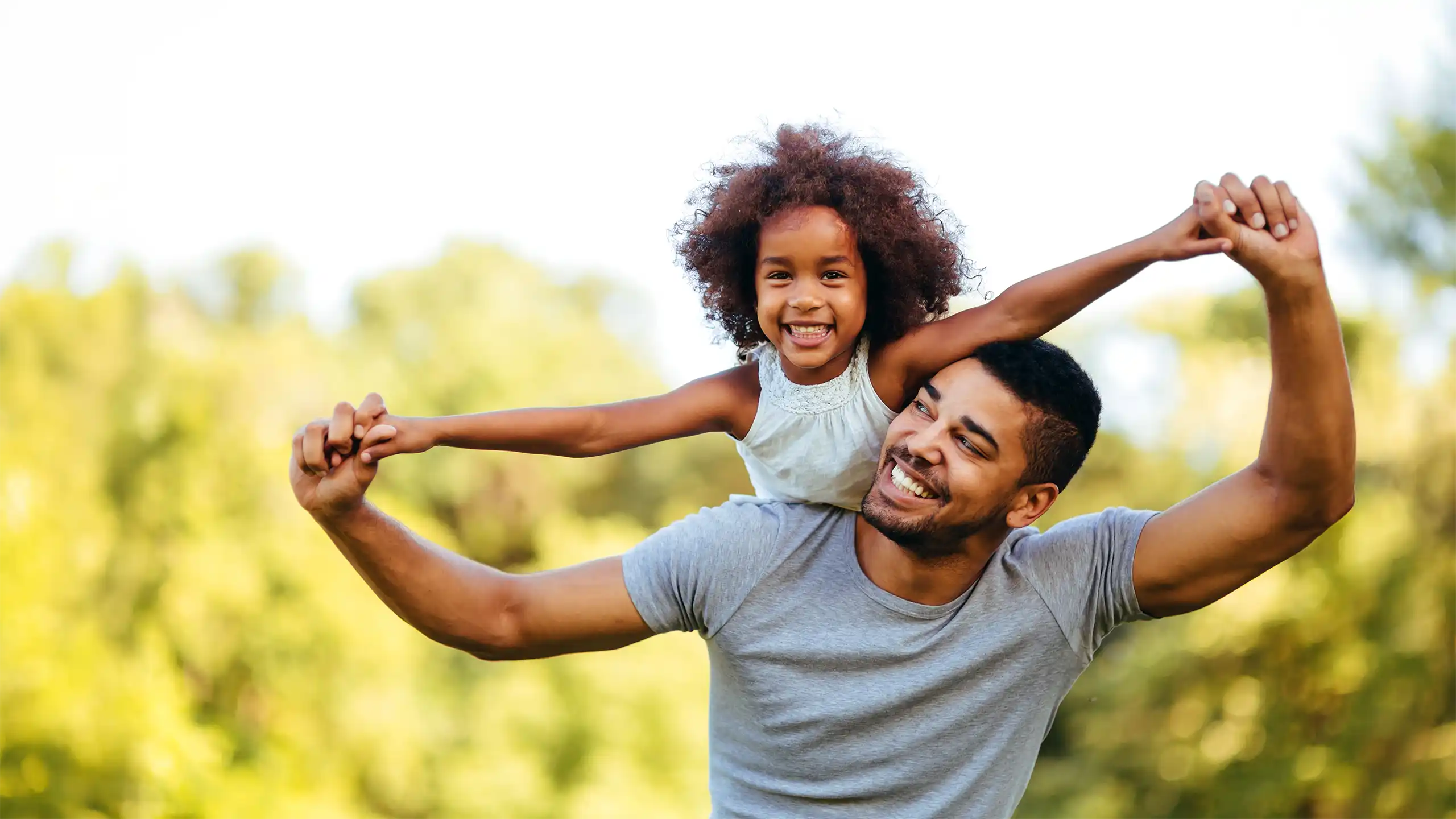 BeWell Chiropractic Dad and Daughter in Park