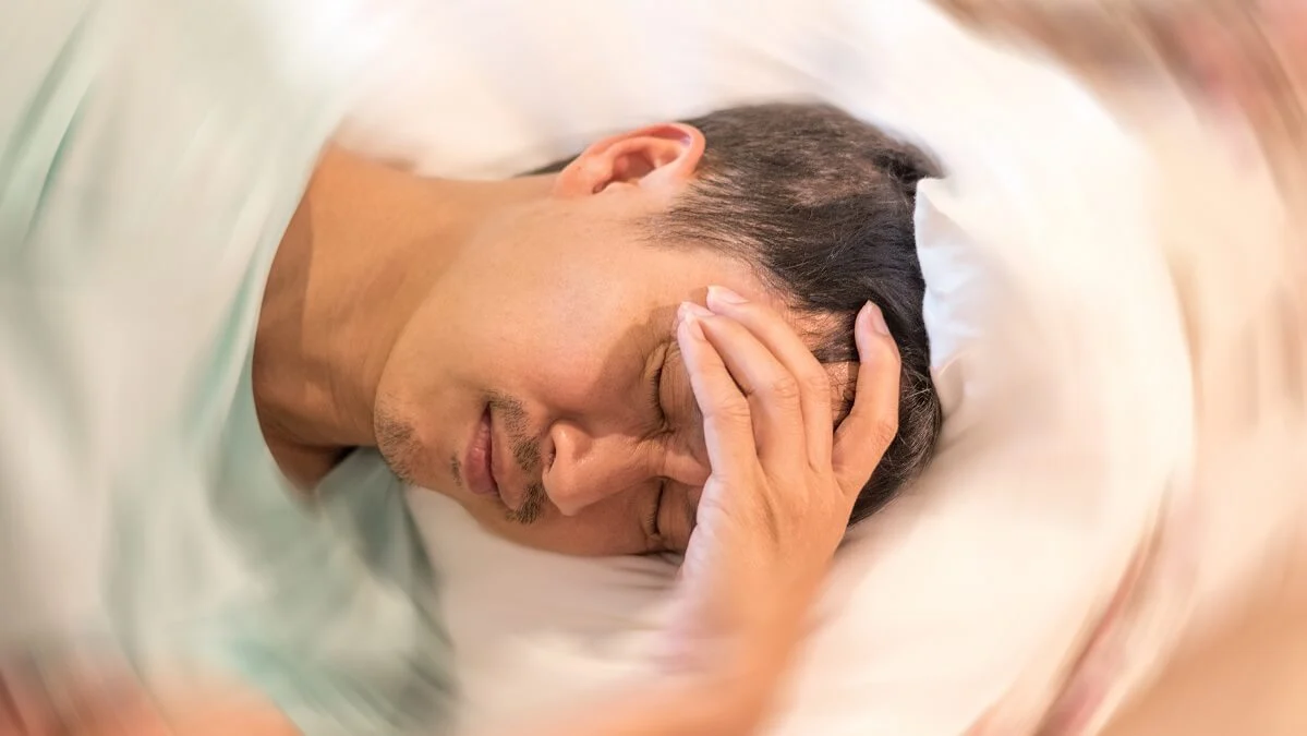 Dizzy in bed